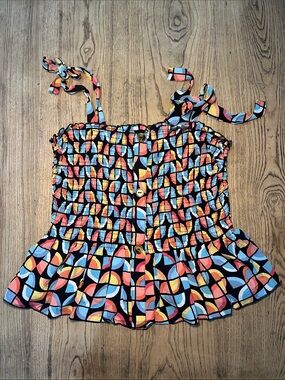 Peplum light weight colorful tie shoulder top. Large